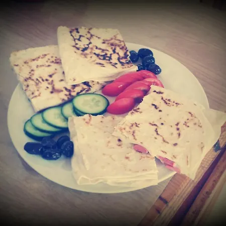 Evin Guest house Side