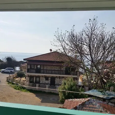 Evin Guest house Side